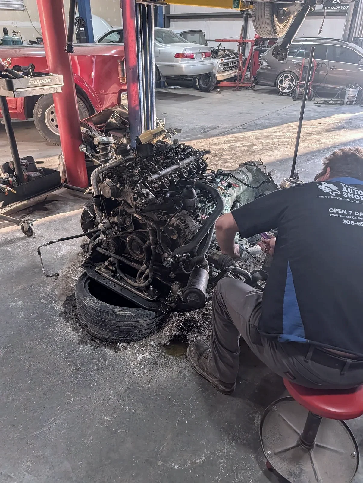 An engine repair technician at The Automotive Shop